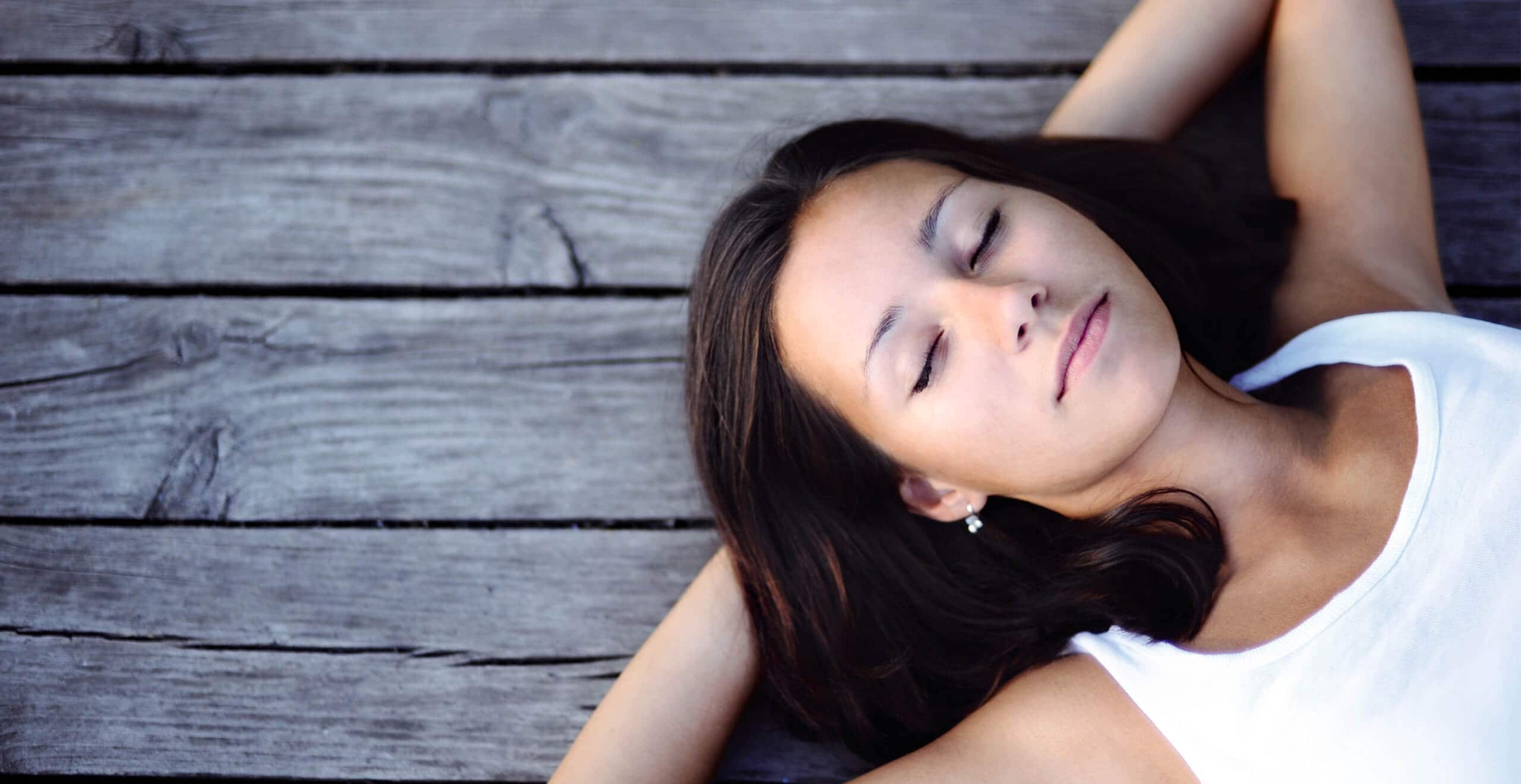 SEAT new car services and maintenance – woman laying down relaxing with hands behind head